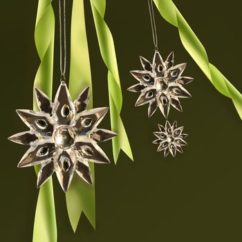 Crystal snowflakes with green ribbons 