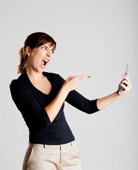 Unhappy woman at cellphone