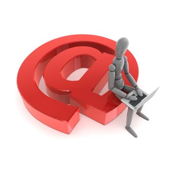 gray lay figure is sitting on a shiny and glossy red AT symbol using a laptop