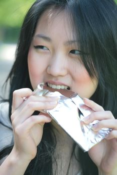 girl eats chocolate