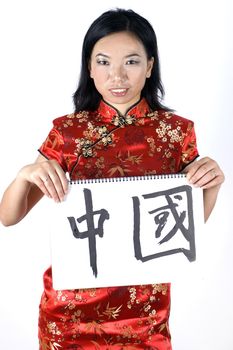 Chinese girl holding card "CHINA"