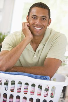 Man Leaning On Laundry 