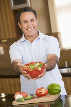 Man Presenting Salad