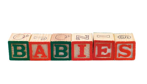 The word babies, spelled using colored letter blocks