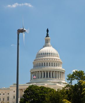 Capitol Building framed by wind turbine