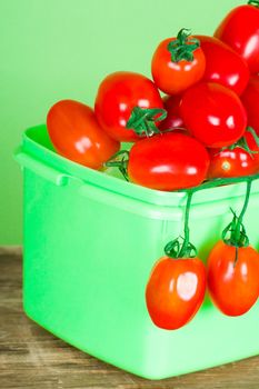 container with fresh tomatoes 