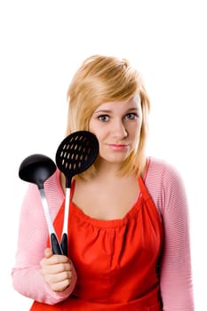 young housewife with kitchen utensil