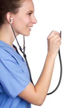 Smiling nurse holding stethoscope