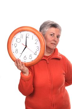 mature woman with clock