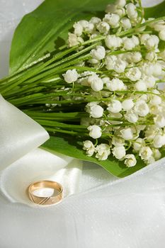 Lily-of-the-valley and wedding ring