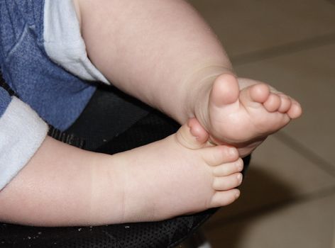 babies feet and toes with chunky legs 