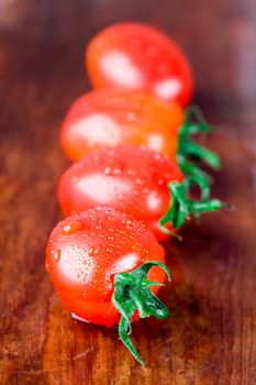 four wet tomatoes