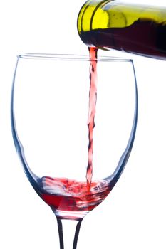 close-up pouring a wine in glass