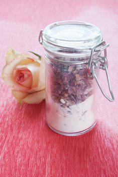 Dried rose petals in a jar