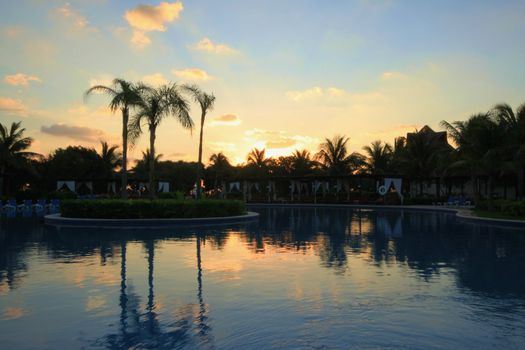 Warm sunrise over pool
