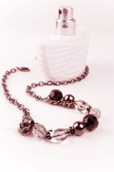 necklace and parfume bottle