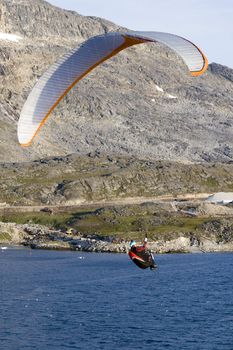 Paraglider over the ocean