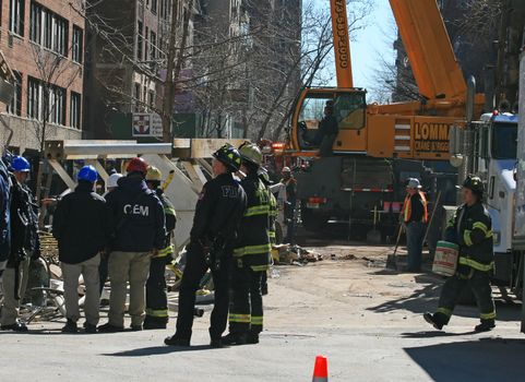 Crane collapse flatten a 4 story building