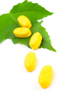 yellow vitamin pills