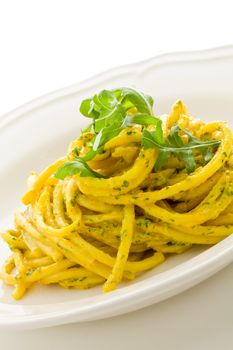 Pasta with Saffron and arugula pesto Isolated