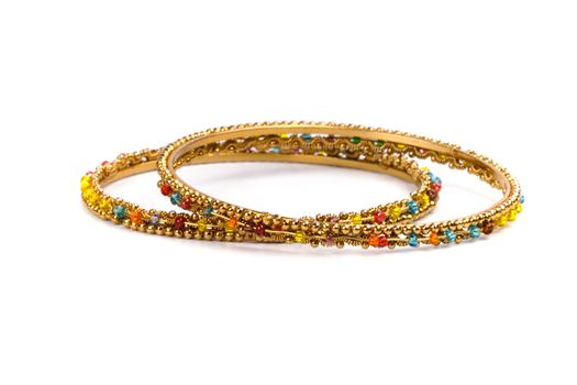 two golden bracelets