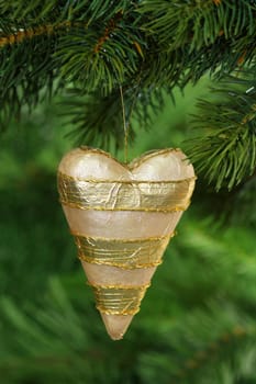 Christmas tree decoration on green background