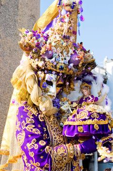 A woman in costume at the Venice Carnival