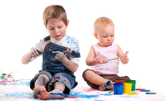 Boy and girl painting