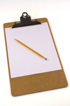 Clipboard, paper and pencil on white background