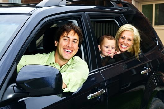 Happy family in car