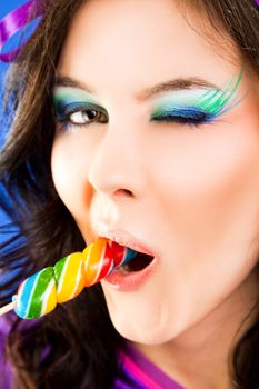 Female licking lollipop blink
