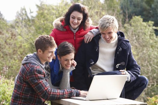 Students with laptop computer