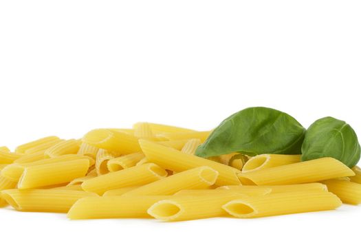 some raw penne rigate with basil