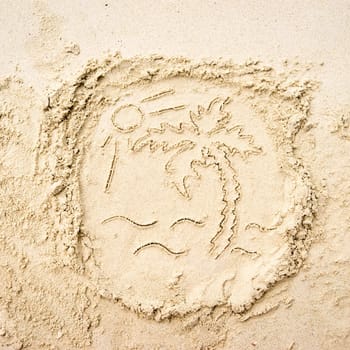 Drawing of palm and sun on the sand