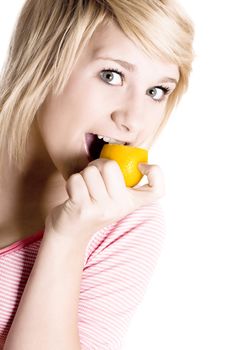 girl eating lemon