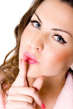 young woman with finger on lips