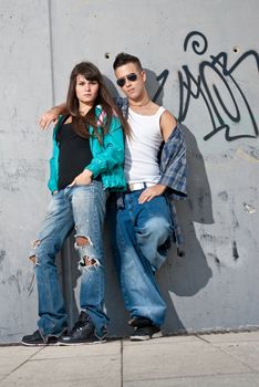 Young couple urban fashion standing portrait
