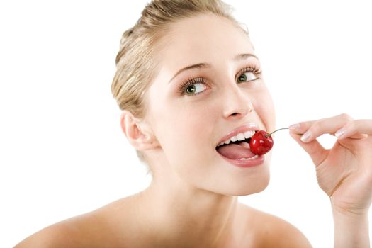 Happy health woman eating cherry