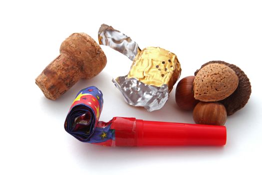 Champagne cork, foil, blower and nuts