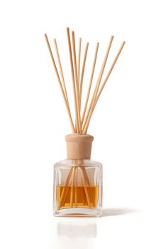 Isolated jar with perfumed incense sticks