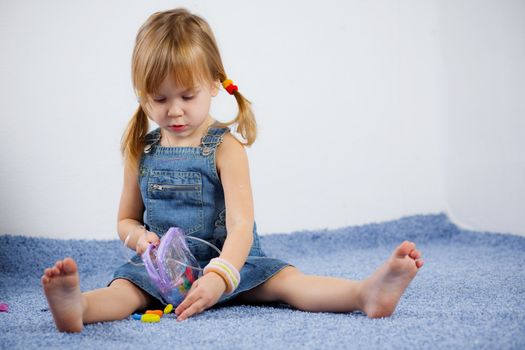 Child playing on carpet