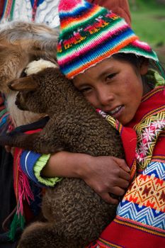 The Peruvian girl and the kid of the Lama.