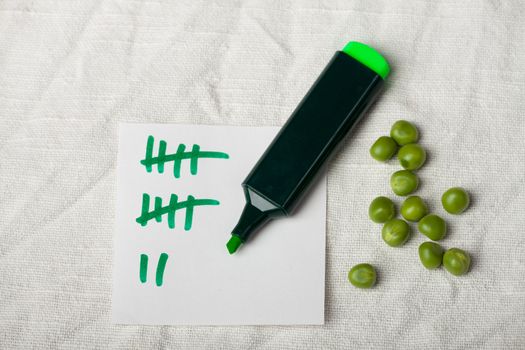 peas and a tally sheet