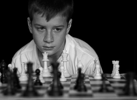 Boy Playing Chess