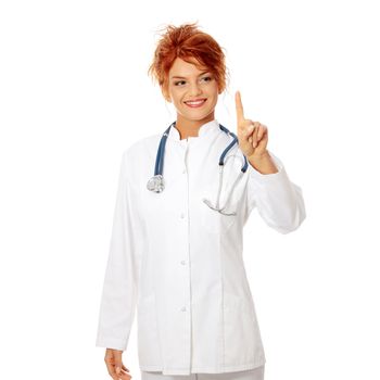 Smiling medical doctor or nurse making a choice