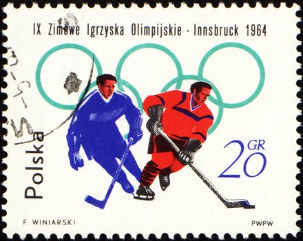 Two hockey players on post stamp