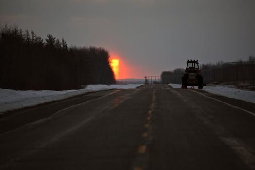 Rising sun along a highway