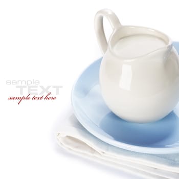white ceramic jug with milk