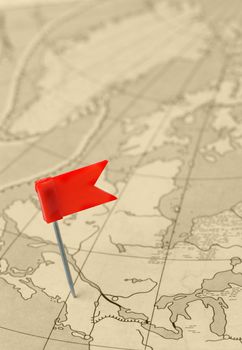 red flag a pin on old map