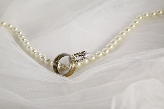 Jewelry on white satin